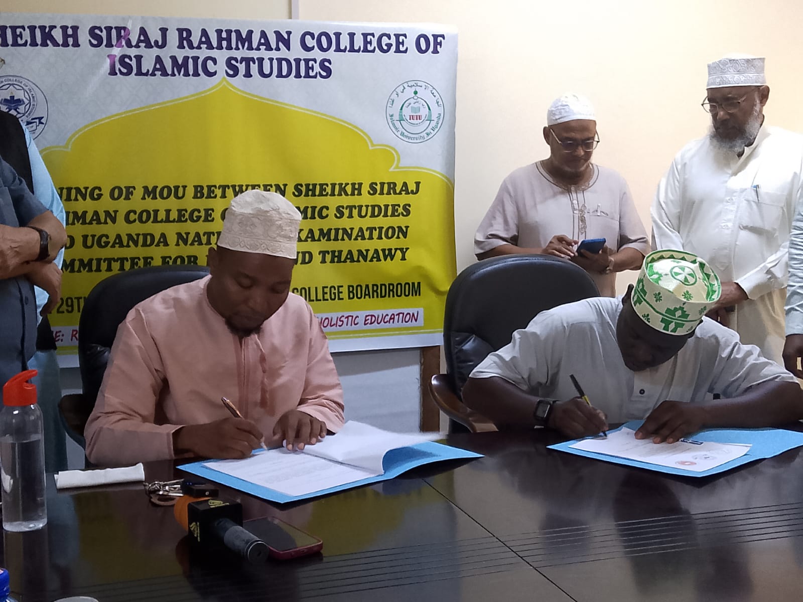 Signing of MoU Between Sheikh Siraj Rahman College and Uganda